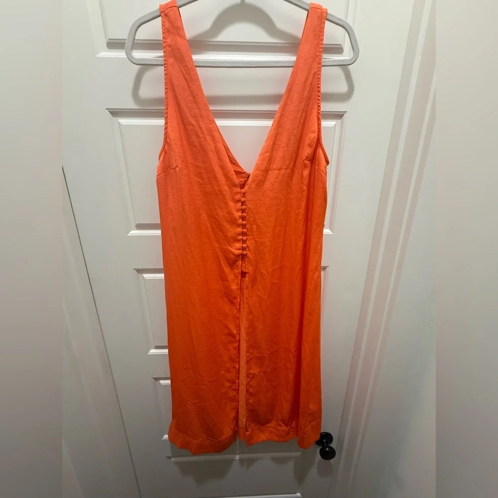 Free People. Orange Long Sleeveless Vneck Front & Back Blouse. Size 12.